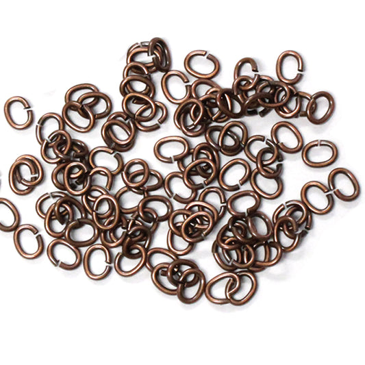 Antique Copper Medium Oval Jump Rings / 100 Pack / 3x4mm ID / 20 Gauge / Sawcut / Open / Plated Brass