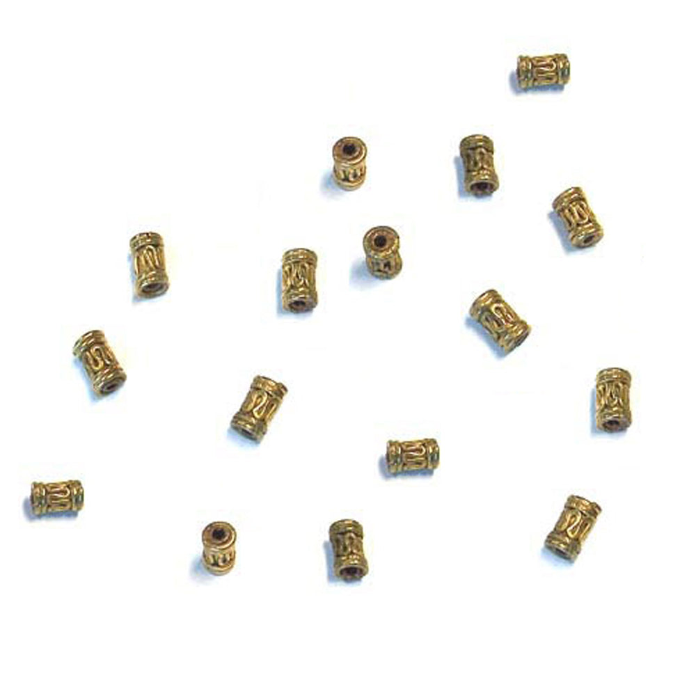 Patterned Tube Cylinder Bead Antique Brass / 9mm long x 6mm diameter / with a wire-like curved adornment around the center