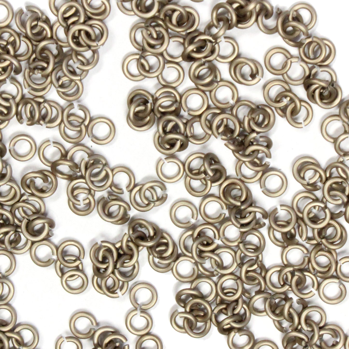 MATTE CHAMPAGNE / 2.4mm 20 GA Jump Rings / 5 Gram Pack (approx 350) / sawcut round open anodized aluminum
