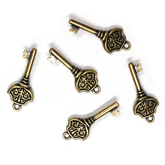 TierraCast Victorian Key Charm / 5 Pack / pewter with a brass oxide finish