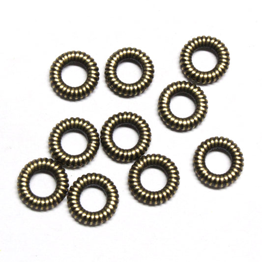 TierraCast 10mm Coiled Ring Bead / 10 Pack / pewter with a brass oxide finish