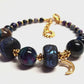 Rainbow Black Celestial Bracelet / 6 to 7 Inch wrist size / gold pewter beads and charms