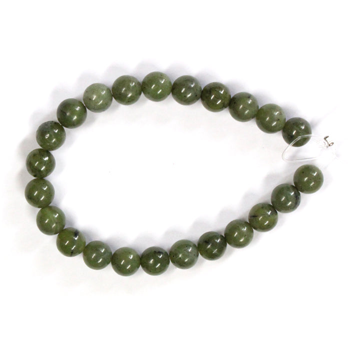 Canadian Jade 8mm Round Beads / 7 Inch - 23 bead strand / a vivid, translucent green with a sprinkling of black inclusions