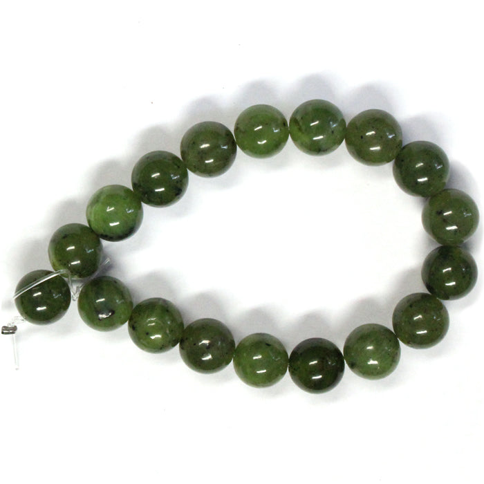 Canadian Jade 10mm Round Beads / 7 Inch - 18 bead strand / a vivid, translucent green with a sprinkling of black inclusions