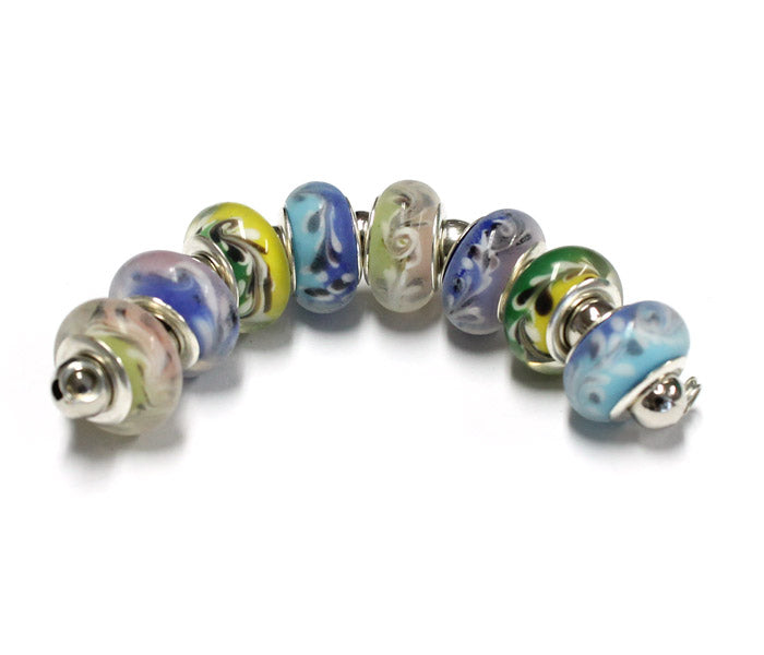 Flower Mirage Lampwork Beads / 8 bead strand / 4.5mm ID / 9x13mm rondelle with a silver core