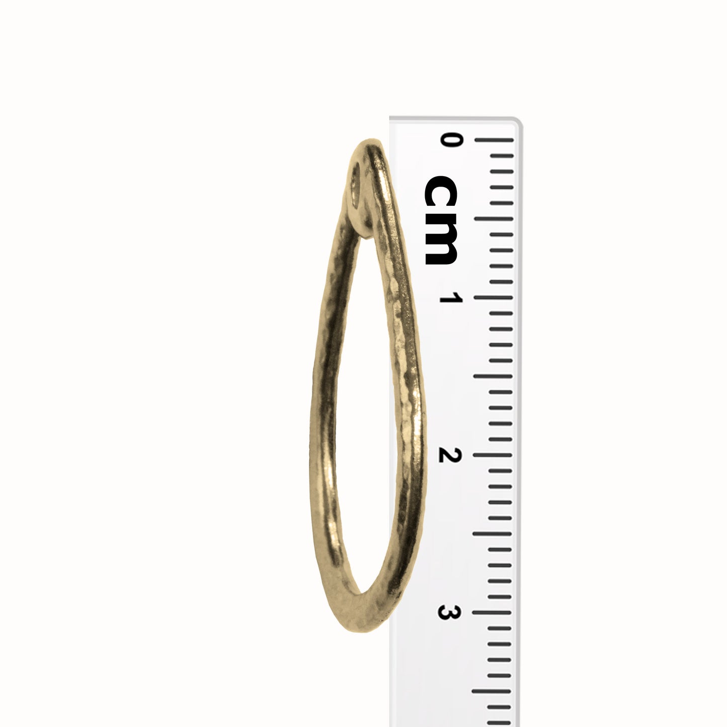 TierraCast Stitch-around Teardrop Charm / plated pewter with a bright gold finish / side view with ruler