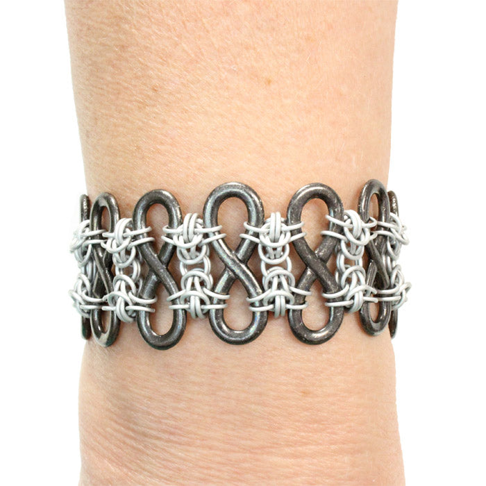 Ad Infinitum Bracelet / up to 7 Inch wrist size / black infinity links chained together with silver matte chainmail