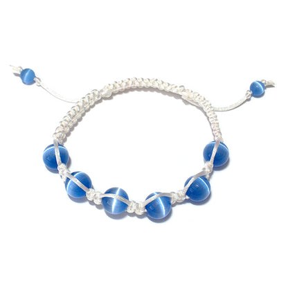 Fiber Optic Blue Macrame Bracelet / adjustable fits 7-0" to 8-0" wrist size / white satin cord