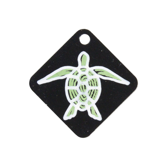 SEA TURTLE CHARM / green and white silhouette on black background / printed on anodized aluminum tags