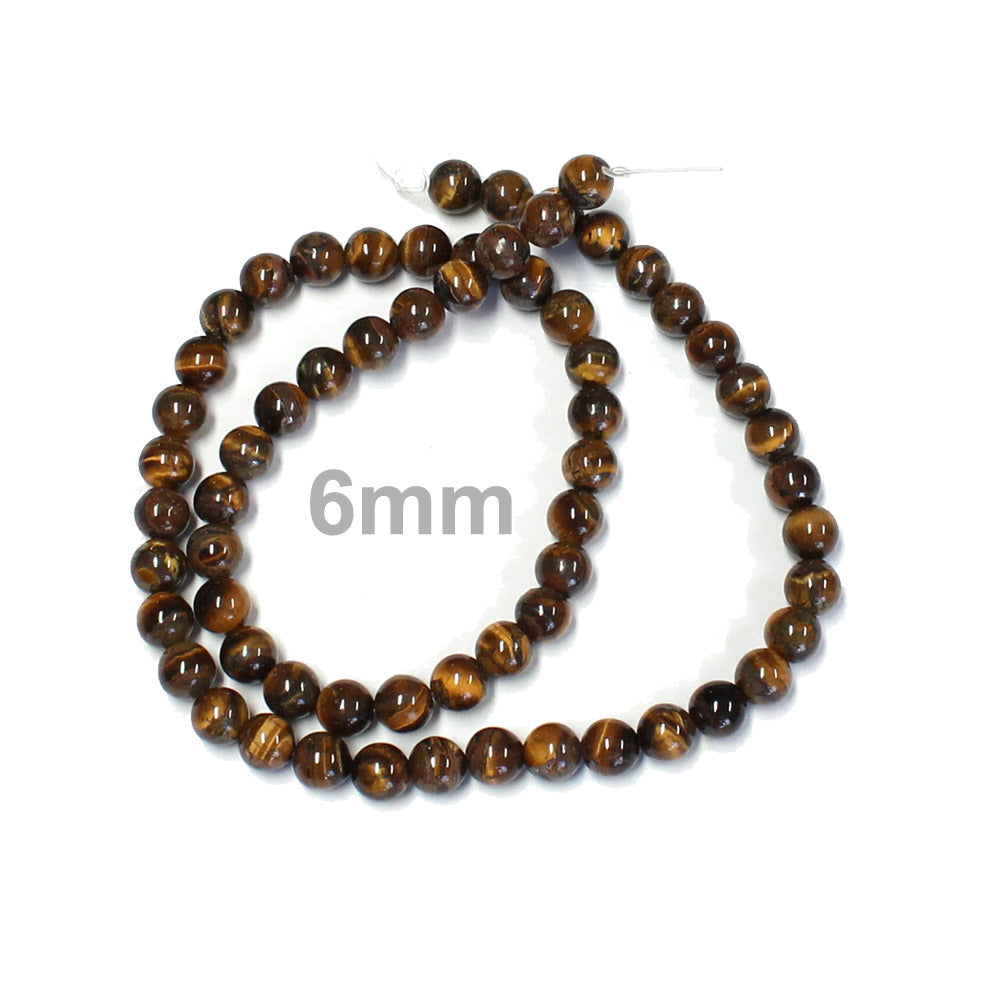 6mm Tiger's Eye / 16" Strand / natural / smooth round stone beads